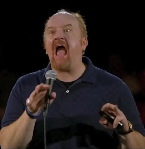 gif of stand up comedian doing funny face as part of impression of IT worker