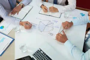 Hands on a plan for total quality management